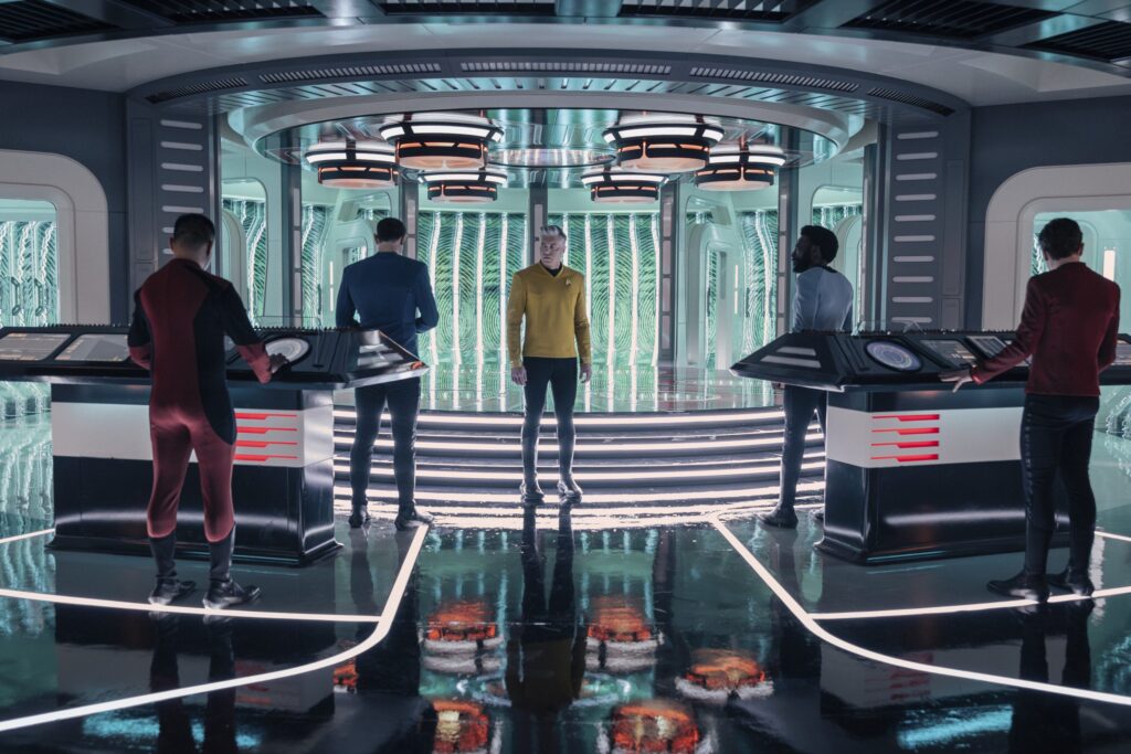 Pike, Spock and M'Benga in the transporter room From Star Trek: Strange New Worlds season four episode one Valles Marineris.