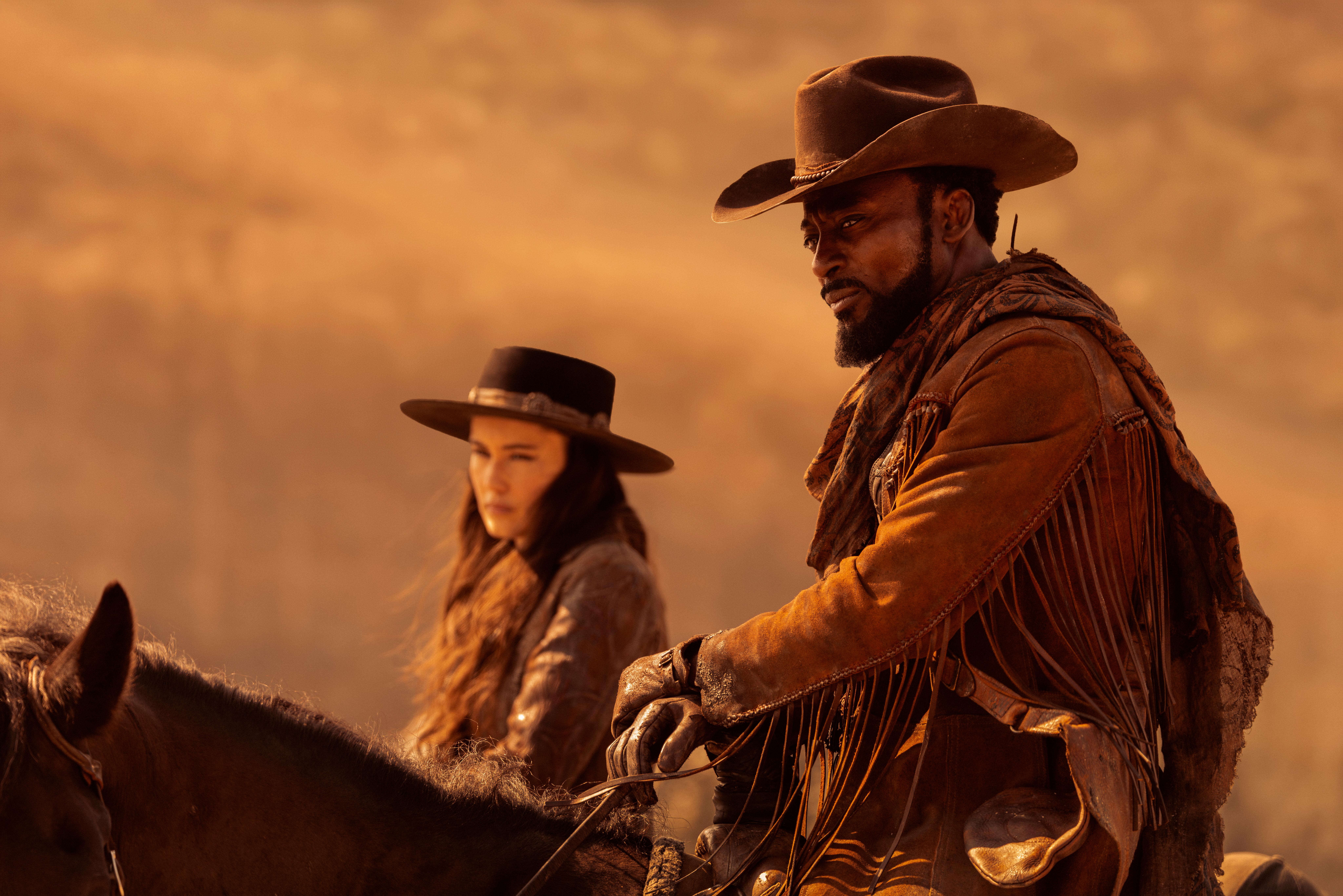 La'an Noonien-Singh and Dr. Joseph M'Benga sit on horses dressed like from a western from Star Trek: Strange New Worlds season four episode one Valles Marineris.