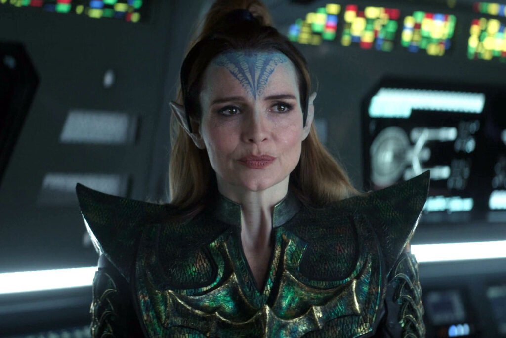 Battle Commander Cassell who is a Martian that commanded a warship 65 million years ago, she has pointed ears and is dressed all in green from Star Trek: Strange New Worlds season four episode one Valles Marineris.